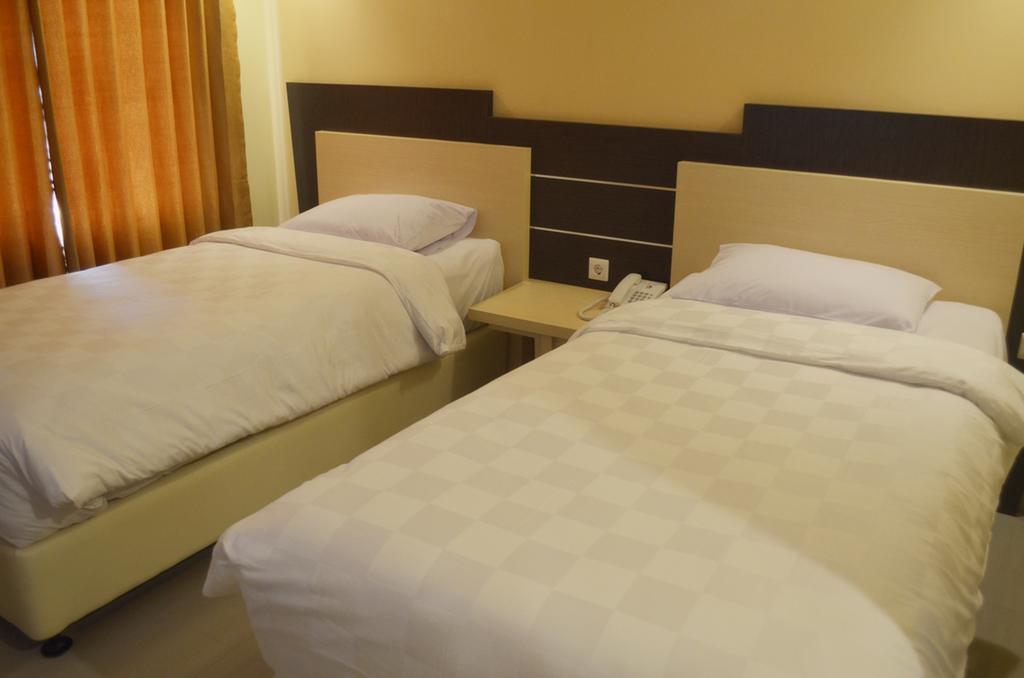 M Hotel Матарам Номер фото